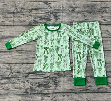 Load image into Gallery viewer, Baby Girls Green Clovers Leopard Bows Top Pants St Patrick Pajamas Sets

